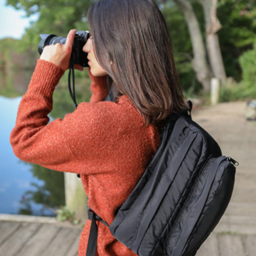 black nylon sling bag